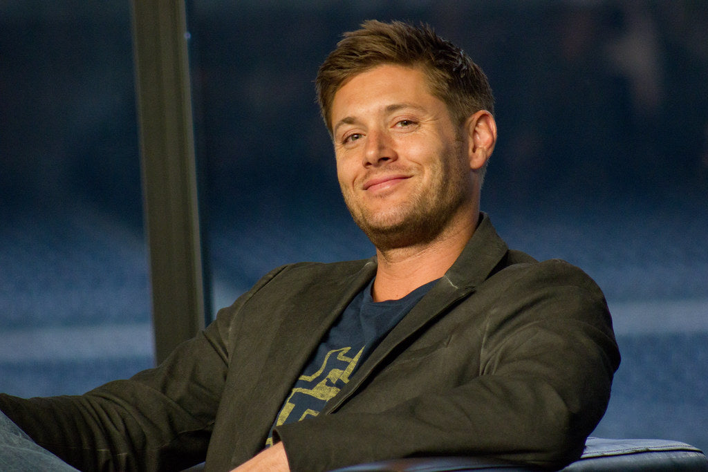 Jensen Ackles looking at the camera and smiling