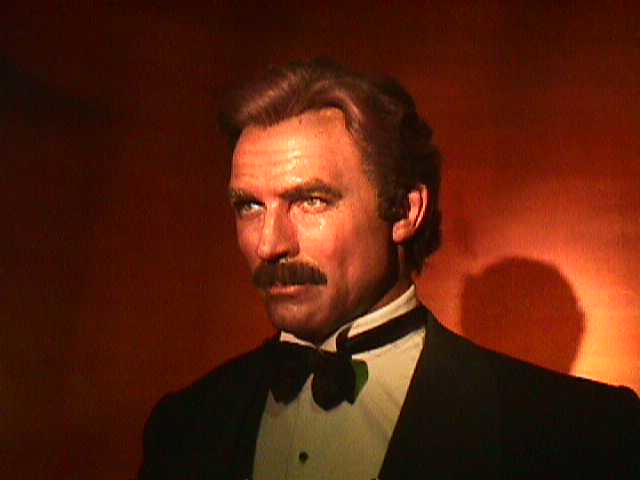 Tom Selleck in a black suit